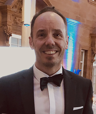 Headshot of Mark Buchner