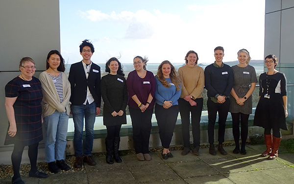 PhD students pictured with postgraduate training leads